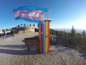 Transgender Pride Flag on Rainbow Outhouse on highest peak in NC